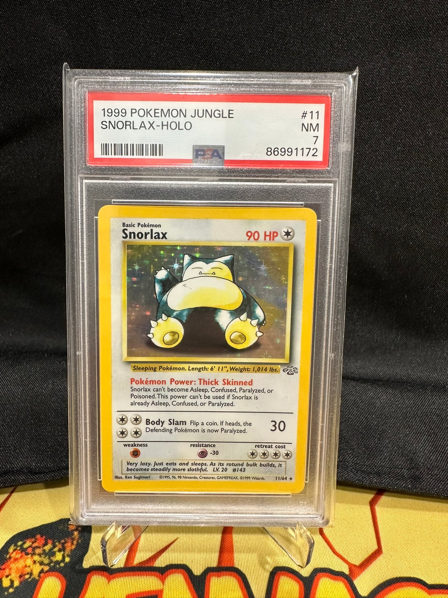 Pokemon Card 11/64 Snorlax Jungle Holo PSA NM 7