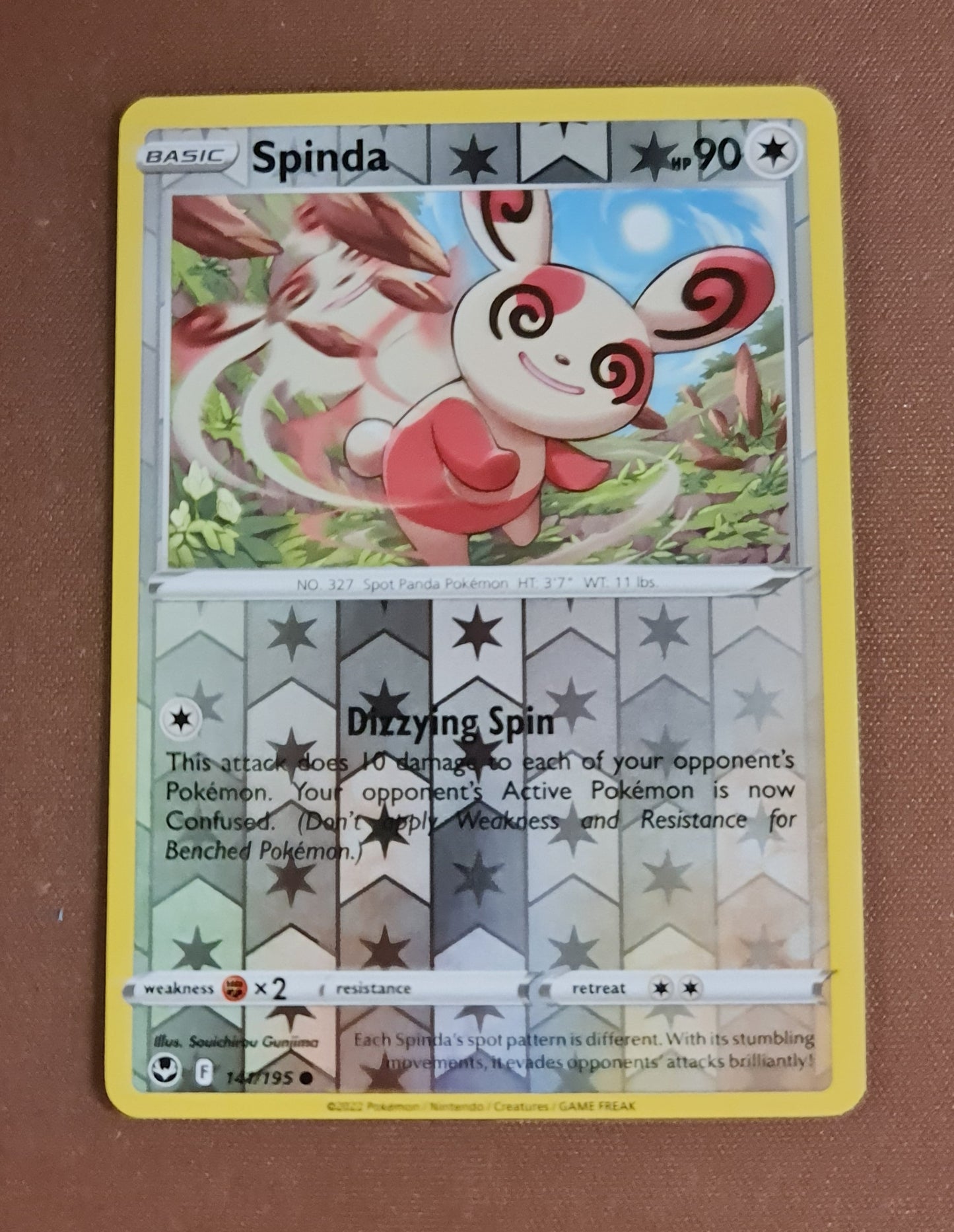 Pokemon Card Silver Tempest 141/195 Spinda Reverse Holo Common *MINT*