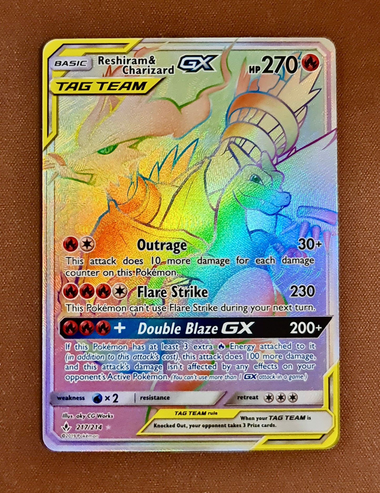 <transcy>Pokemon Card Unbroken Bonds 217/214 Reshiram &amp; Charizard Tag Team GX Hyper Rare</transcy>