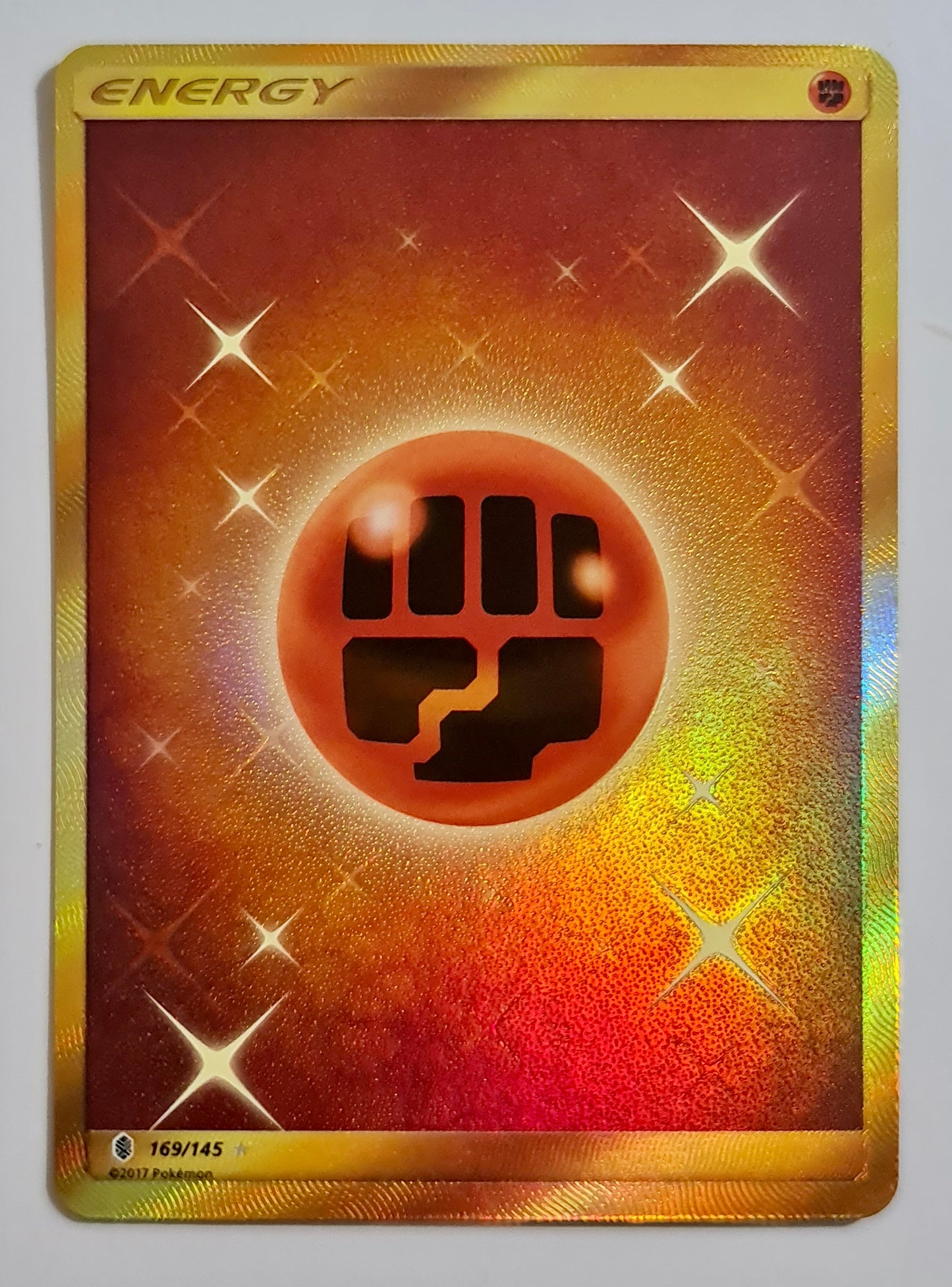 Pokemon Card Sun & Moon Guardians Rising 169/145 Fighting Energy Secret Rare